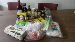 Ingredients, including spam and the world's largest spring onions called 'pa'.